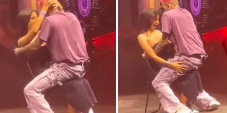 Şarkıcı Chris Brown, konserde kadın hayranının kucağına oturarak dans etti