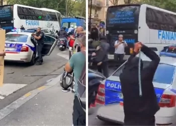 Fransa’da göstericiler polis aracına saldırdı, memur silah çekerek kalabalığı dağıttı